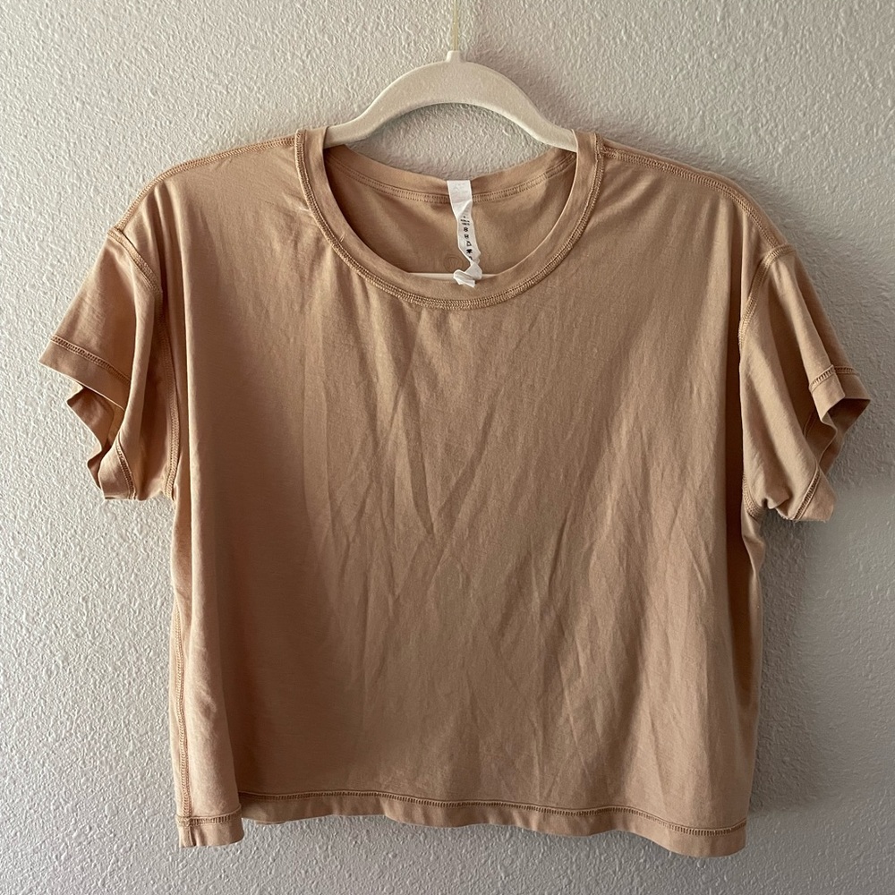 tan lululemon cropped shirt